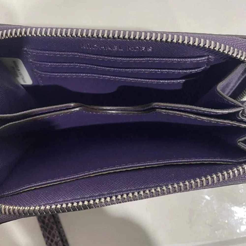 Michael Kors Purple Textured Clutch Wristlet.
